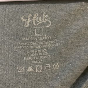 Ladies size large HUK Vneck top